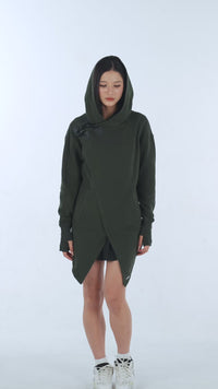 woman wearing green hoodie